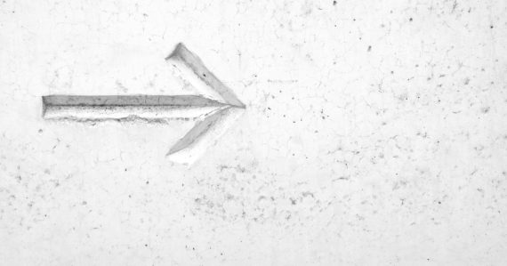 Right arrow sign on wall, illustrating tech trends shaping 2011