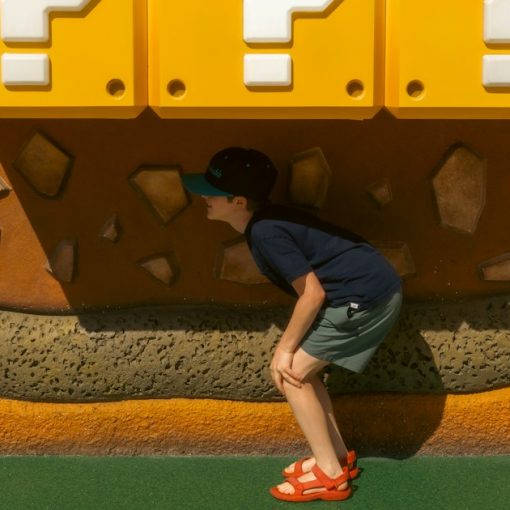 Child looking at three question mark blocks, illustrating questions about the cloud