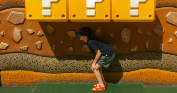 Child looking at three question mark blocks, illustrating questions about the cloud