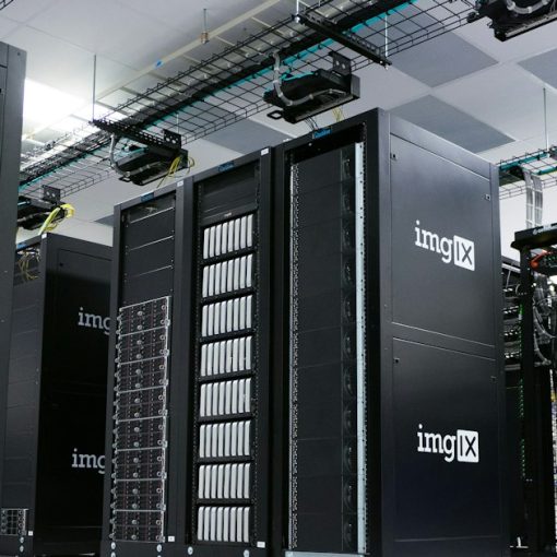 Rows of black server racks with white logos in a data center, illustrating inside AT&T cloud computing centers