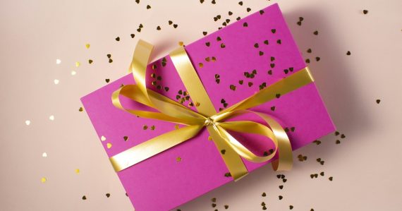Wrapped gift box with a bow, illustrating hidden benefits of cloud computing