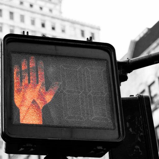 Closeup of street signage displaying stop, illustrating executives resisting cloud computing