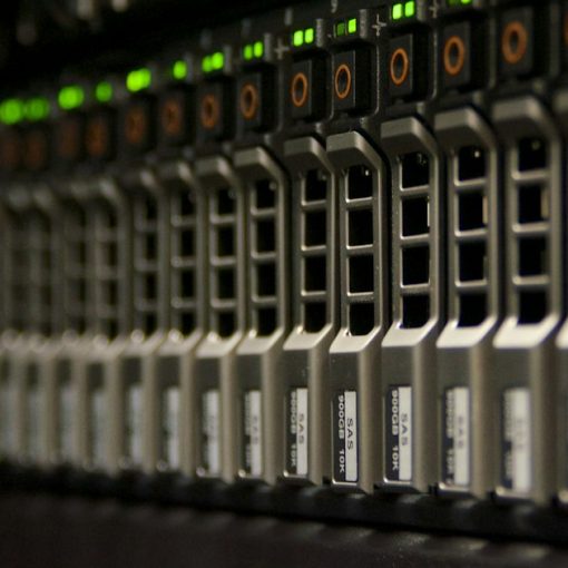 Server rack with blinking green lights, illustrating virtualization and IT management