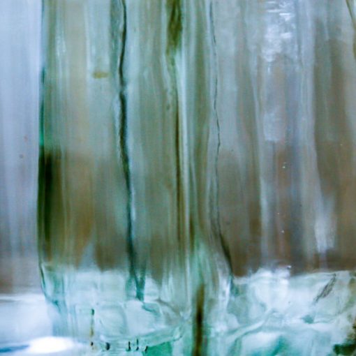 Clear glass bottle with water, illustrating clarity about cloud migration