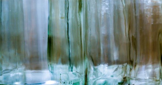 Clear glass bottle with water, illustrating clarity about cloud migration