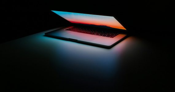 Gray and black laptop computer on surface, illustrating clever uses for cloud services