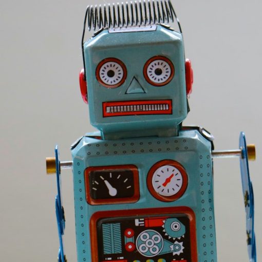 Blue plastic robot toy, illustrating cloud computing as the next automation wave