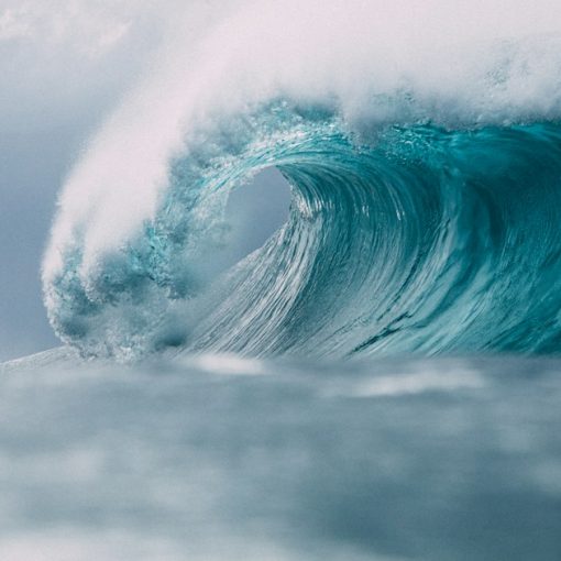 White and blue ocean waves, illustrating business communications moving to the cloud