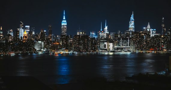 A city skyline at night, illustrating cloud computing market growth to 2020