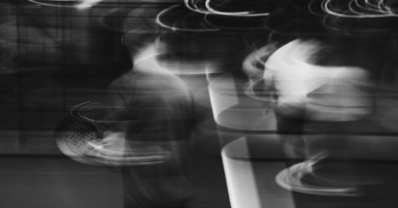 Blurred figures walking, captured in motion, illustrating the blurring of cloud service models