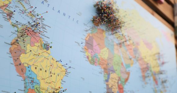A map of the world with pins on it, illustrating the global cloud computing scorecard