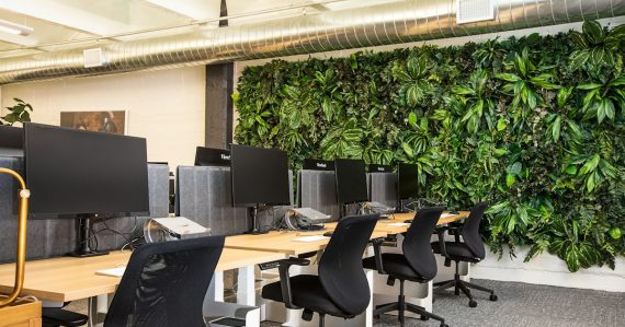 Black office rolling chairs and table, illustrating cloud computing for startups