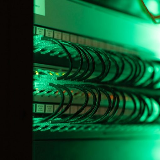 A close up of a server in a server room, illustrating cloud data security and privacy