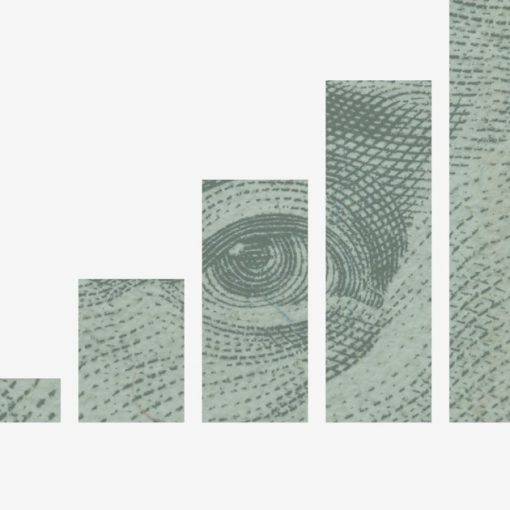 A bar chart of rising wealth made from US dollar bills, illustrating cloud raising total IT expenditure