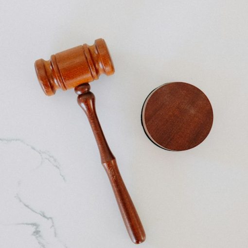 Wooden gavel and block on marble, illustrating legal battles over cloud data
