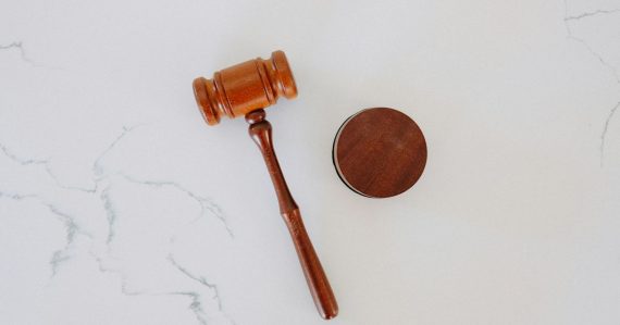 Wooden gavel and block on marble, illustrating legal battles over cloud data