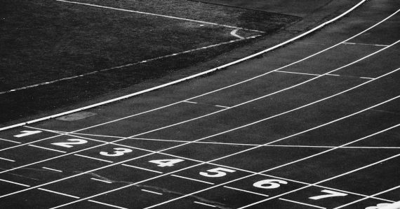 A black and white photo of a running track, illustrating cloud readiness for businesses