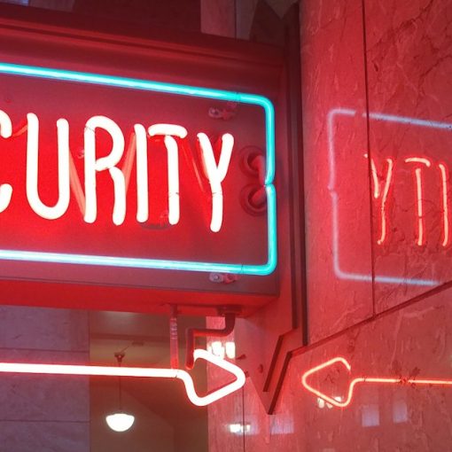 A red security sign and a blue security sign, illustrating security lessons for the cloud