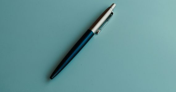 Silver and blue click pen, illustrating reviewing cloud service contracts