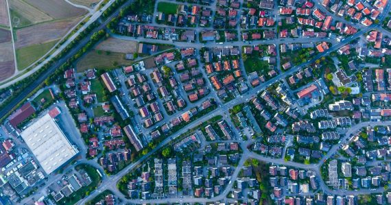 Aerial photography of houses and buildings, illustrating cloud sprawl