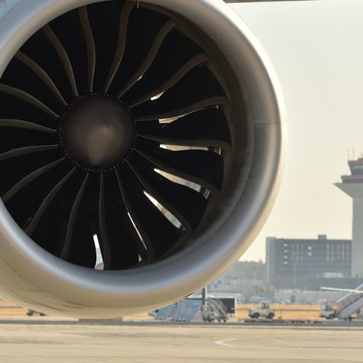 A large jet engine sitting on an airport tarmac, illustrating supercomputing in the cloud