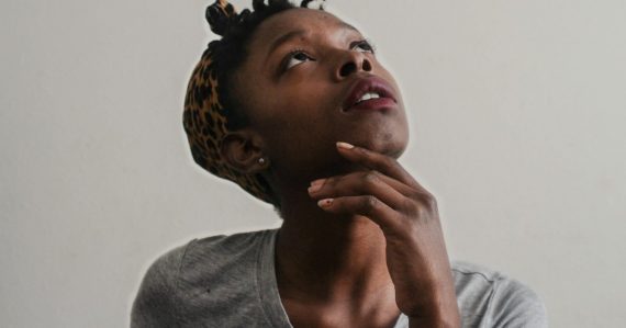 Woman in gray top, illustrating the arrival of cloud thinking