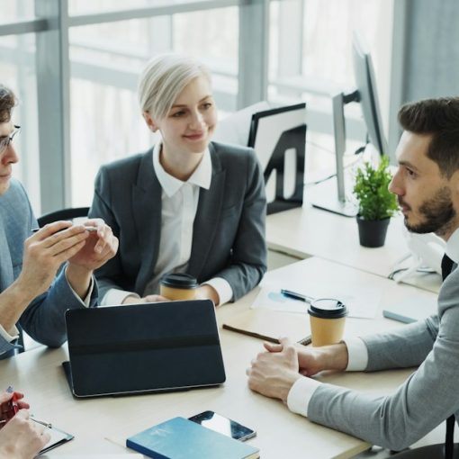 Diverse business team collaborating in a modern office, illustrating vetting cloud vendor security