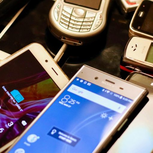Assorted color mobile phones, illustrating risks of IT consumerization