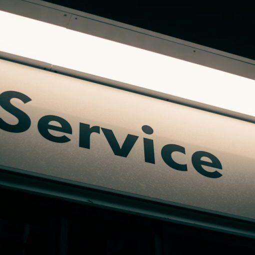 A sign with the word Service in black letters on a white background, illustrating CRM in the cloud