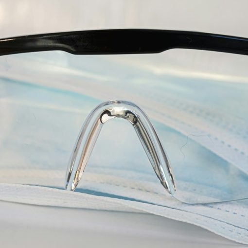 Black framed eyeglasses on white textile, illustrating executive expectations on virtualization