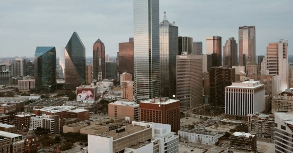 A view of a city with tall buildings, illustrating Dallas companies adopting cloud computing