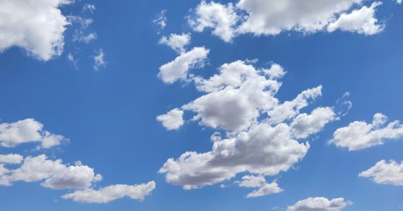 White clouds and blue sky during daytime, illustrating datacenter virtualization compared with cloud