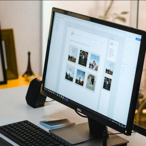 Black flat screen computer monitor and black computer keyboard, illustrating the future of the desktop