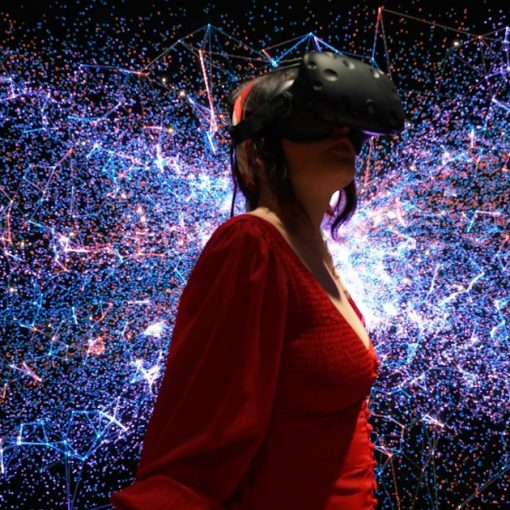 A woman in a red dress wearing a virtual reality headset, illustrating virtual desktops