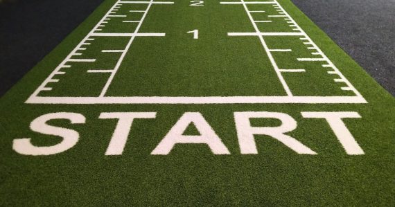 A football field with the word start written on it, illustrating desktop virtualization's slow start