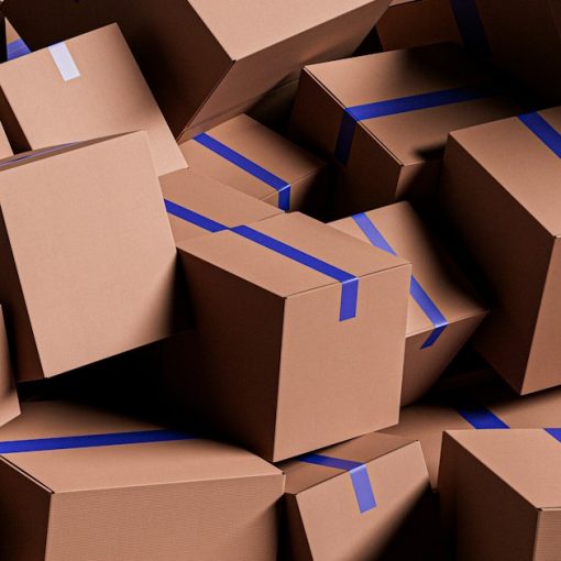 A large pile of brown cardboard boxes with blue tape, illustrating desktop virtualization ROI traps