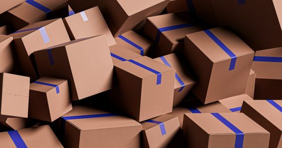 A large pile of brown cardboard boxes with blue tape, illustrating desktop virtualization ROI traps