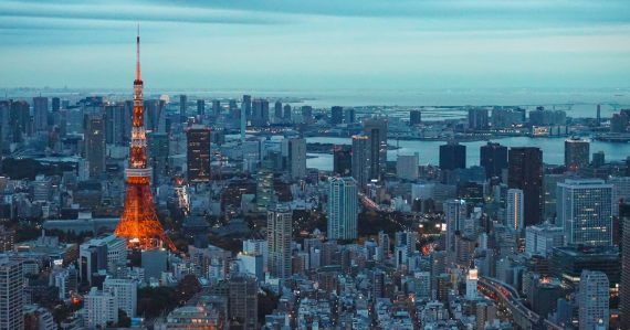 Tokyo tower illuminated at dusk with city skyline, illustrating an IT manager's earthquake experience