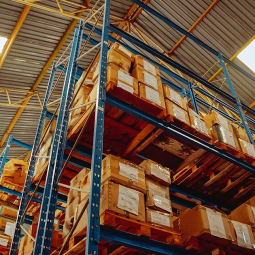 A large stack of boxes in a warehouse, illustrating cloud EDI
