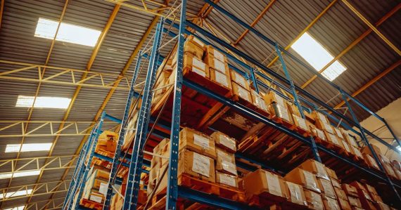 A large stack of boxes in a warehouse, illustrating cloud EDI