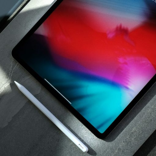 Black iPad with white stylus pen, illustrating enterprise ready tablets