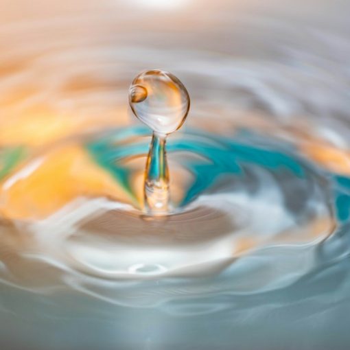 Water drop causing a ripple on a water surface, illustrating the essence of cloud computing