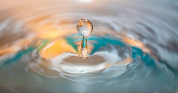 Water drop causing a ripple on a water surface, illustrating the essence of cloud computing