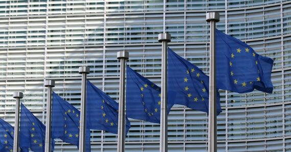 Row of European Union flags, illustrating a European cloud computing strategy