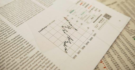 Financial newspaper with stock chart, illustrating finance directors and cloud computing