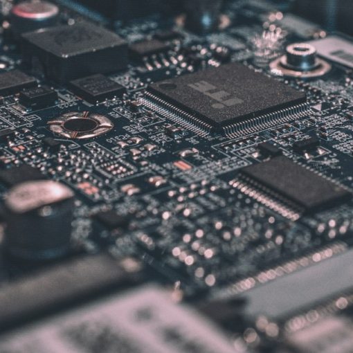 Macro photography of black circuit board, illustrating investing in HPC in the cloud