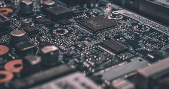 Macro photography of black circuit board, illustrating investing in HPC in the cloud