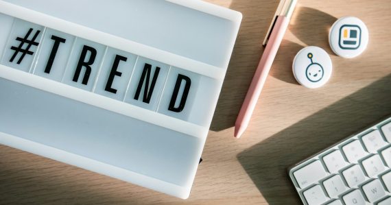 A keyboard with the word trend spelled on it, illustrating notable trends in virtualization
