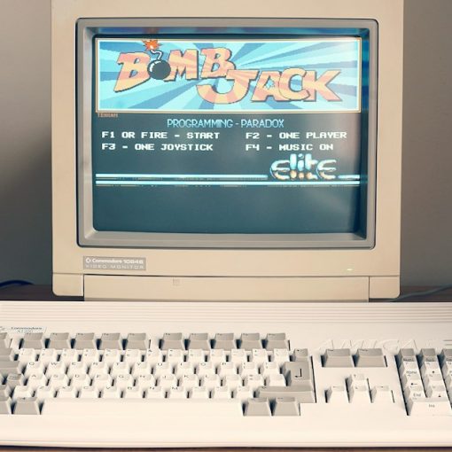 Vintage personal computer on a desk, illustrating the Internet then and now