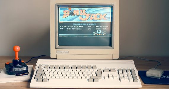 Vintage personal computer on a desk, illustrating the Internet then and now